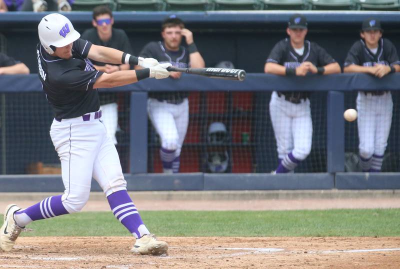 Wilmington's Lucas Rink scores a run as Newman catcher Daniel Kelly watches the play during the Class 2A third place game on Saturday, June 1, 2024 at Dozer Park in Peoria.