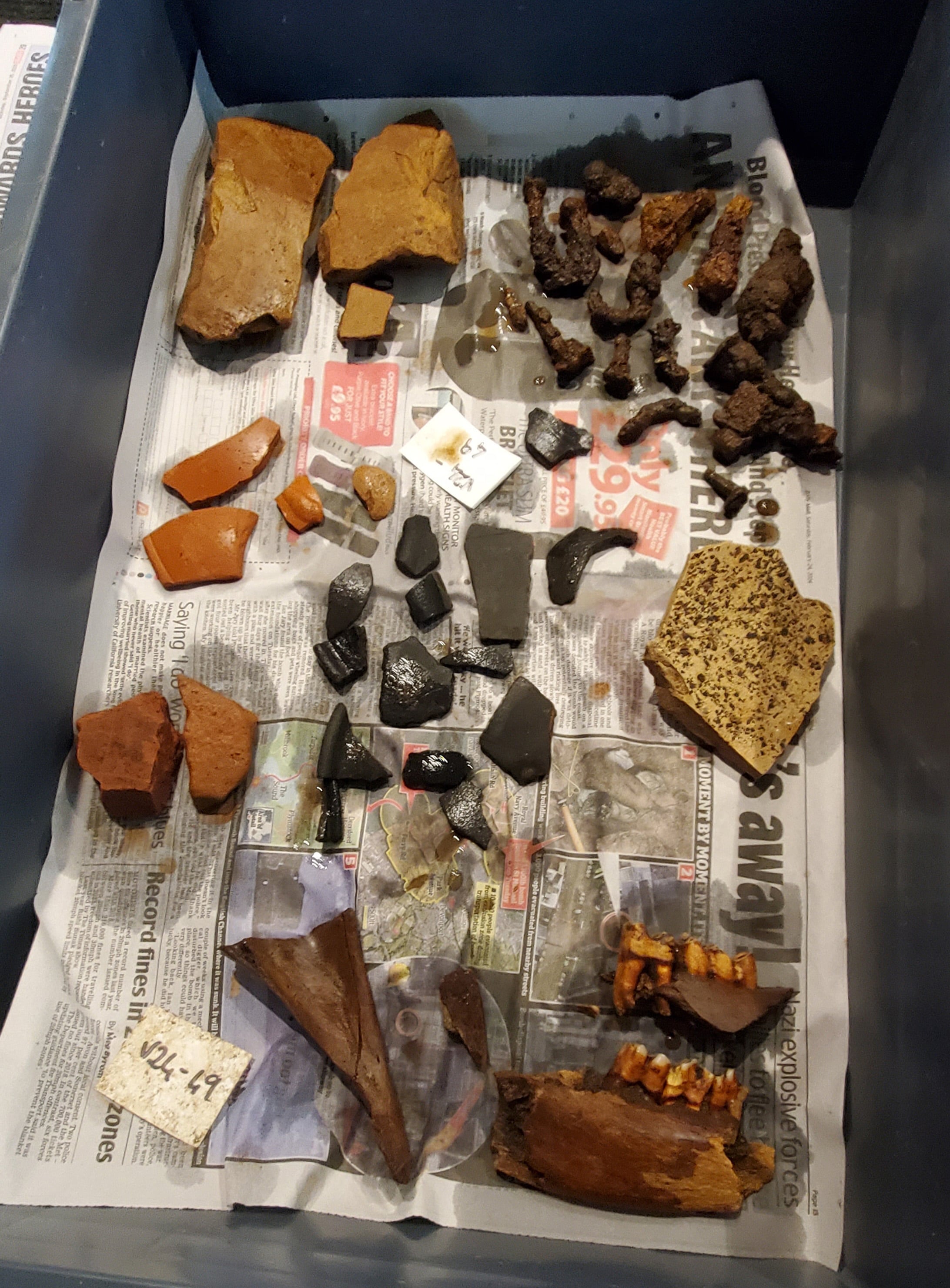 Illinois Valley Community College archaeology professor Jeff Spanbauer is as happy piecing pottery shards together as he is discovering them. He enjoys identifying artifacts and piecing together the puzzle they create of history. This box kept him busy at the British site, and includes different types of Roman pottery, animal bones, iron artifacts and nails.