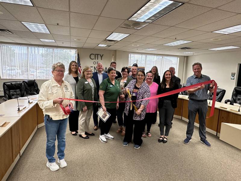 The Genoa Area Chamber of Commerce welcoming the Genoa-Kingston Kiwanis Club with a ribbon-cutting