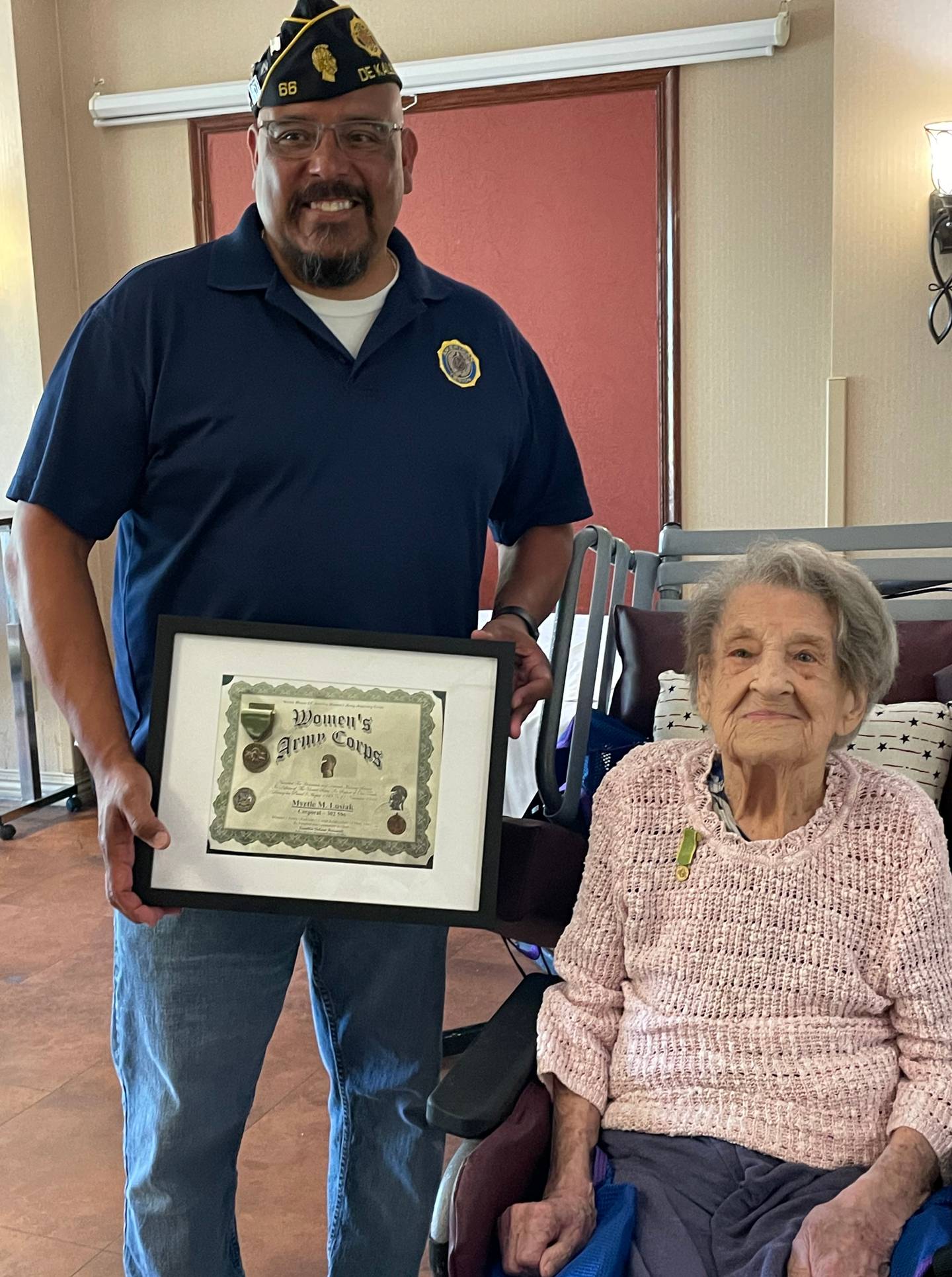 (Left to right); DeKalb American Legion Post 66 commander Manuel Olalde and Myrtle Lusiak