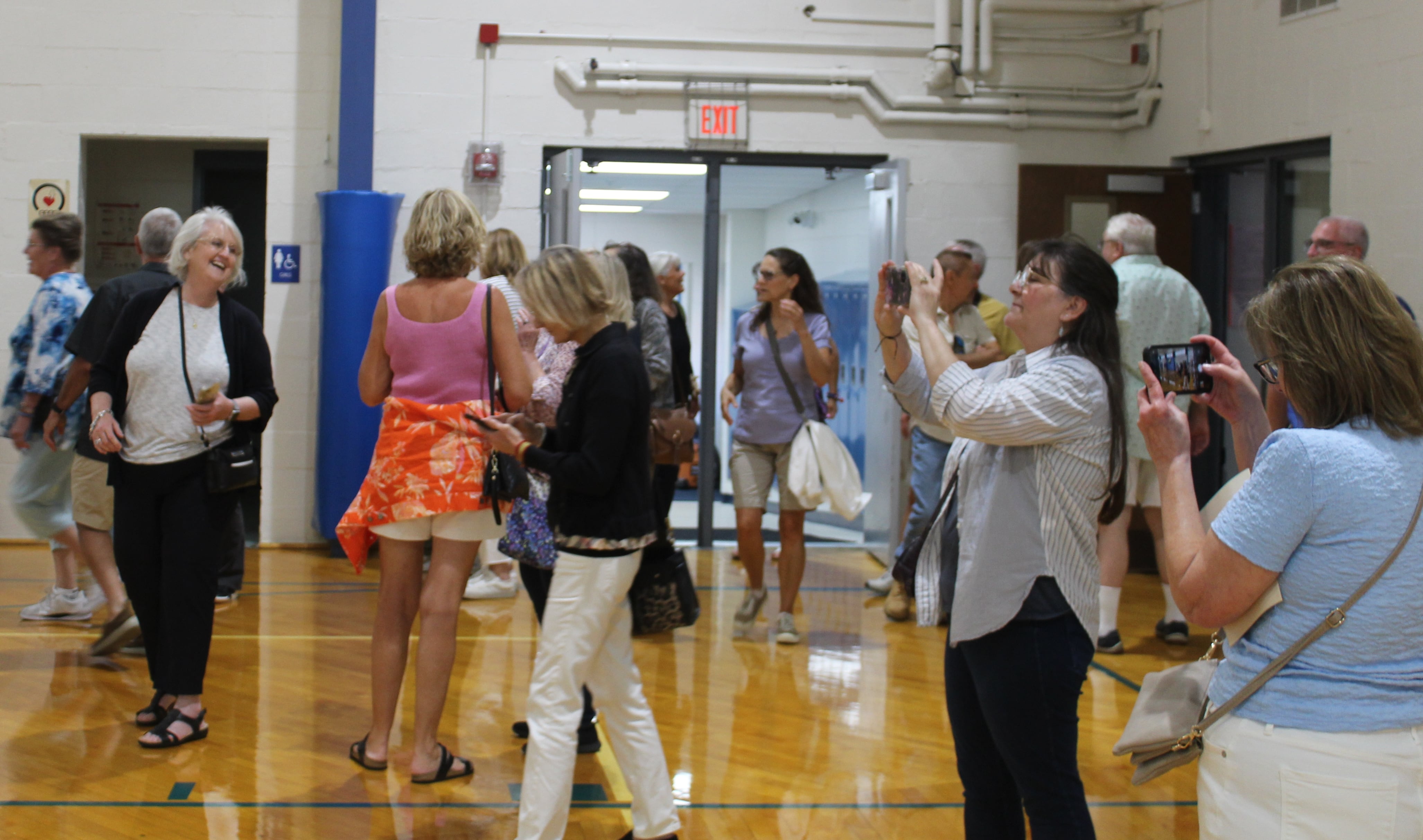 The Fox River Grove Orchard School class of 1974 gathers at the school gym on Saturday, Aug. 10, 2024.