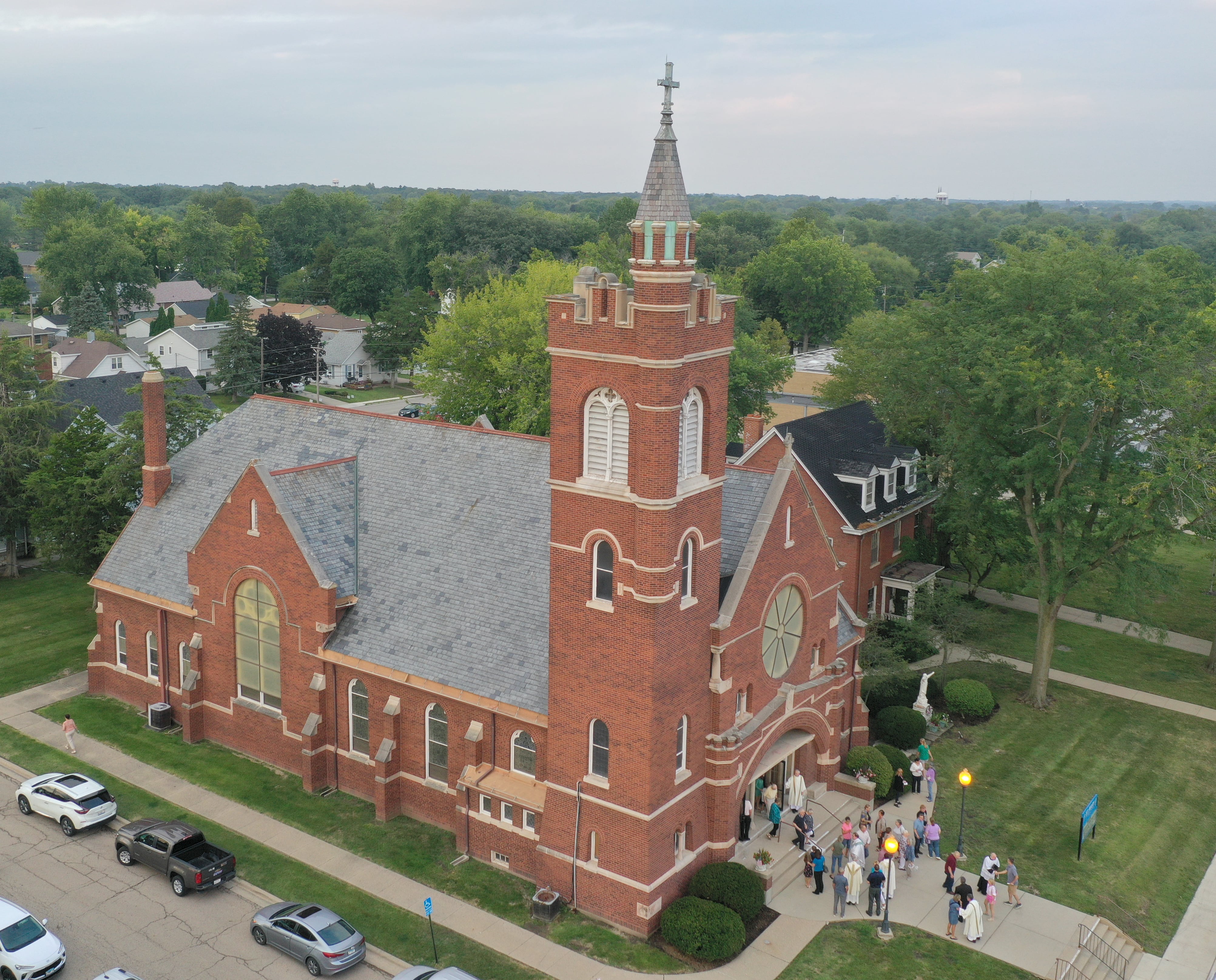 An aerial photo of St. Mary's Church as hundreds of parishioners exit during the final Mass on Thursday, Aug. 15, 2024 in Peru. The church was founded in 1867.