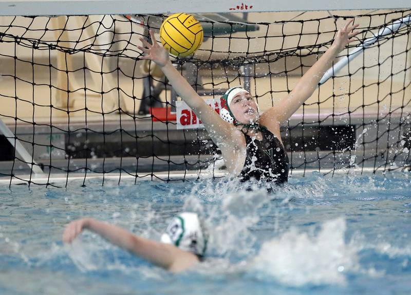 YorkÕs Eva Graefe (1) saves a shot against Hersey during the IHSA State Water Polo consolation match Saturday May 20, 2023 at Stevenson High School in Lincolnshire.