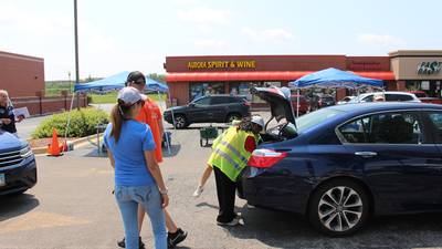 Kane, Kendall residents turned out early for Community Recycle & Shred Day in Aurora draw