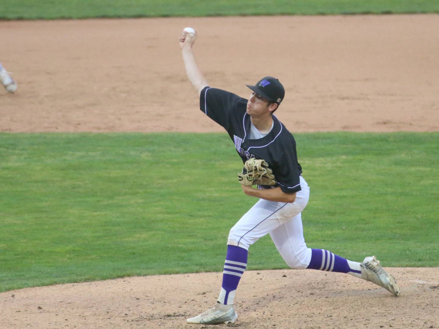 Wilmington's Ryan Kettman fires a pitch to St. Anthony during the Class 2A semifinal game on Friday, May 31, 2024 at Dozer Park in Peoria.