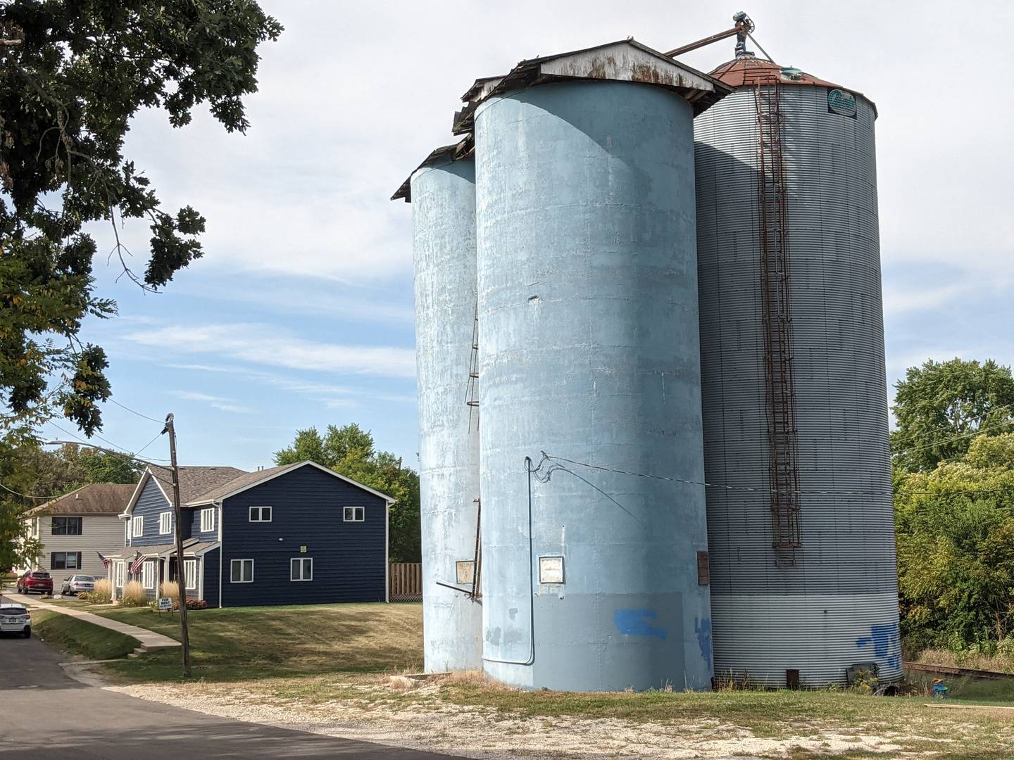 In the coming weeks, two vacant silos in Oswego’s downtown will get a splash of color.

The silos are located on Adams Street near Van Buren Street. In October, muralist Jason Watts plans to start on a mural design depicting scenes of the Fox River, bridge, flora and fauna, trees, and a farm scene.