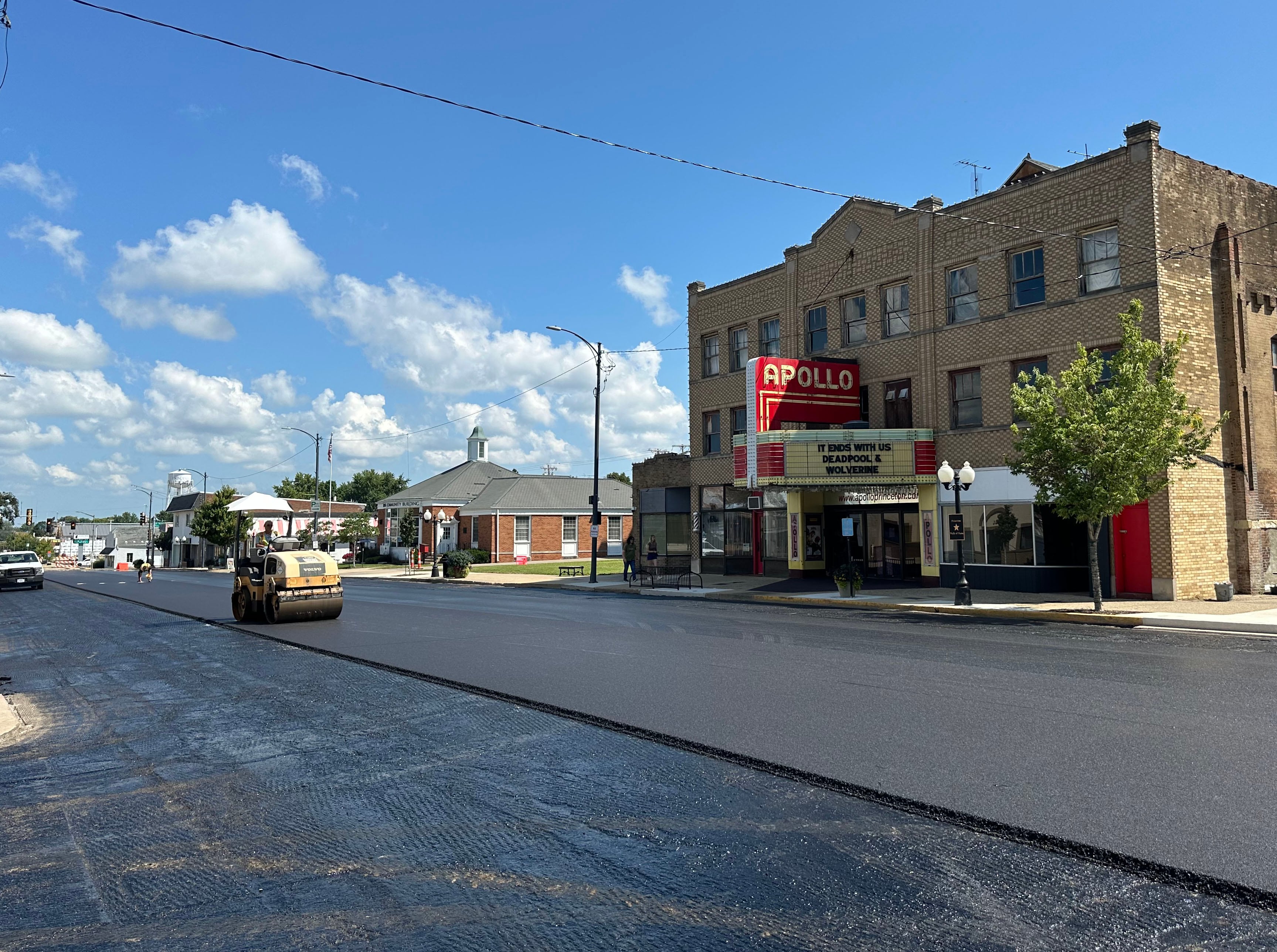 Crews pave South Main Street on Tuesday, Aug. 13, 2024 downtown Princeton. Advanced Asphalt is resurfacing the street downtown. Construction crews applied the first asphalt layer Tuesday. A  second asphalt layer will be poured Wednesday, and painting parking spots and crosswalks Thursday. The road is expected to reopen Saturday morning.