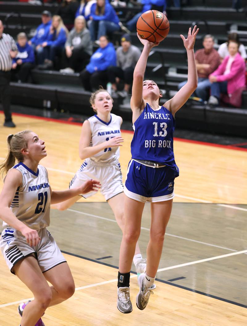 Hinckley-Big Rock's Mia Cotton gets to the basket ahead of Newark’s Addison Ness Thursday, Jan. 18, 2024, during the Little 10 girls basketball tournament at Indian Creek High School in Shabbona.