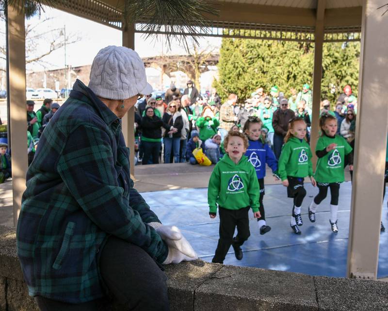 Joyce Disanto of Lemont watches Bailey Murray academy of Irish dancing during the St. Patrick’s festivities on Saturday March 9, 2024, in downtown Lemont.