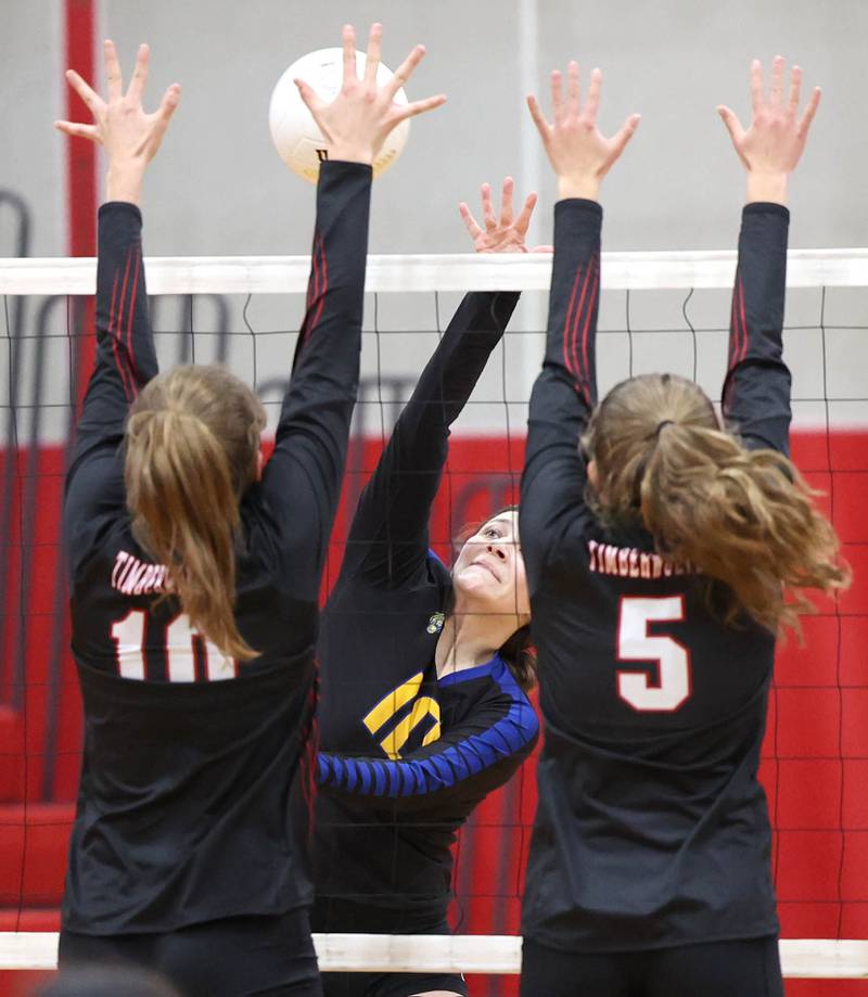 Somonauk's Alexis Matejovsky tries to get a ball past two Indian Creek blockers during their regional first round match Tuesday, Oct. 25, 2022, at Aurora Christian High School in Aurora.