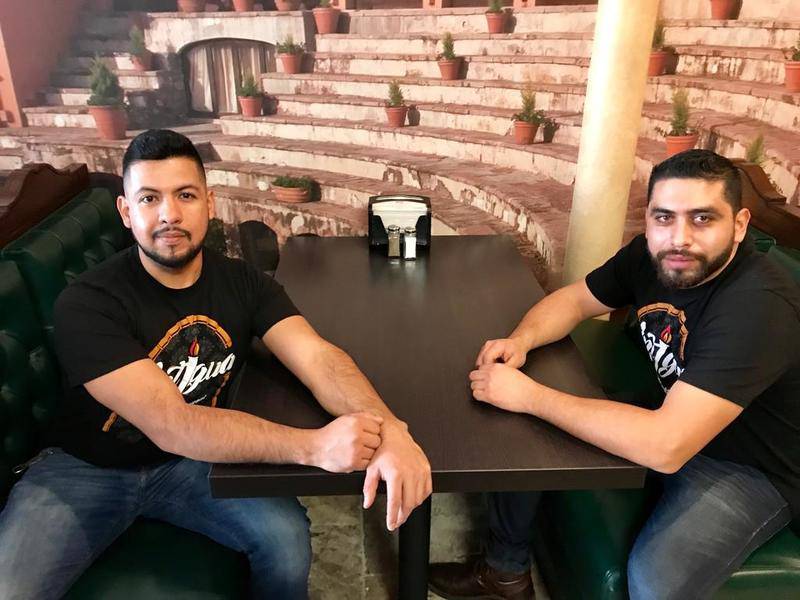 Manager Victor Rodriguez (left) and owner Luis Rodriguez posed for a photo during the lunch rush Friday at Antigua Mexican Grill, 1500 Carlemont Drive, Crystal Lake.