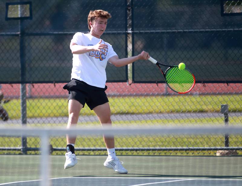 Lyons Township’s Jack McLane returns the ball during a doubles match with partner Mason Mazzone (not pictured) in the state championship preliminaries at Buffalo Grove High School on Thursday, May 23, 2024.