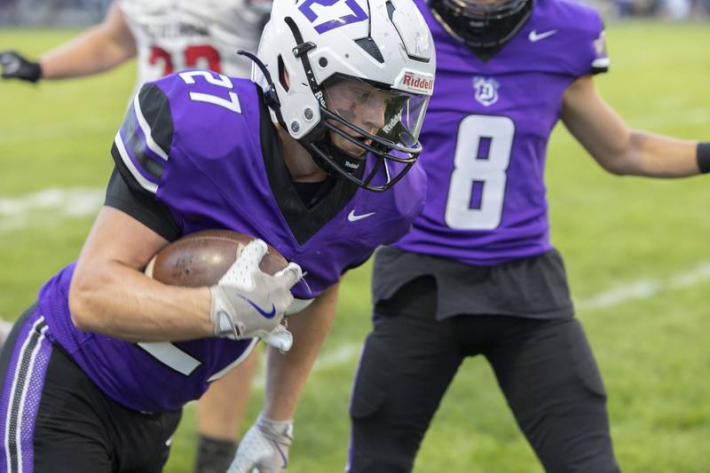 Dixon’s Eli Davison picks up yards against Stillman Valley Friday, Aug. 30, 2024 at Dixon High School.