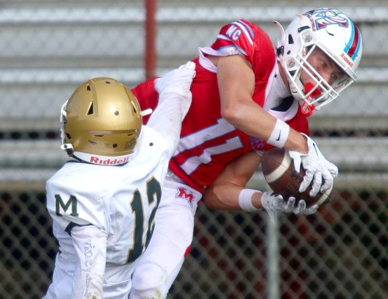 Marian Central’s Maxwell Kinney snags a reception before hustling in for a touchdown against Bishop McNamara in varsity football action on Saturday, Sept. 14, 2024, at George Harding Field on the campus of Marian Central High School in Woodstock.