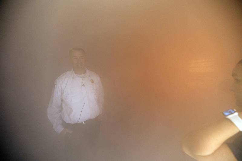 Rock Falls Deputy Chief Kyle Sommers shows off the foggy conditions meant to imitate a smoke filled house that firefighters will work in Wednesday, May 1, 2024 for training purposes.