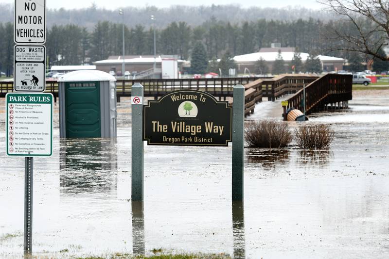 Heavy rain followed by a hail storm hit Oregon Tuesday morning flooding low-lying areas like The Village Way on the south side of town.