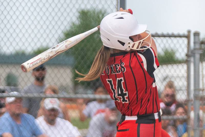 Yorkville's Sara Ebner (14) doubles driving in two runs against Oswego East during the Class 4A Oswego softball sectional semifinal game between Yorkville and Oswego East at Oswego High School on Tuesday, May 30, 2023.