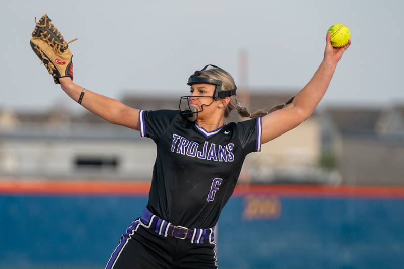 Downers Grove North's Ava Gusel (6) delivers a pitch against Oswego during a softball game at Oswego High School.