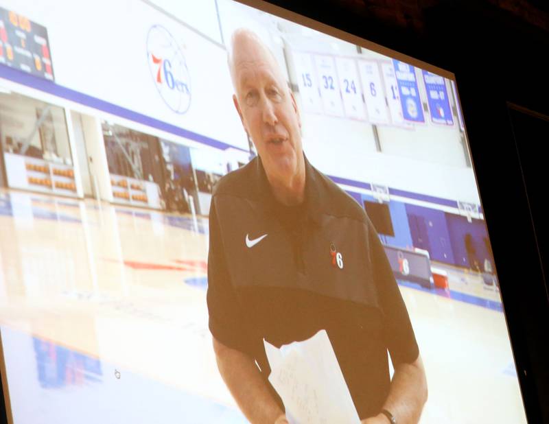 Tom McGinnis winner of the distinguished media award speaks during a video presentation during the Illinois Valley Sports Hall of Fame awards banquet on Thursday, June 6, 2024 at the Auditorium Ballroom in La Salle.