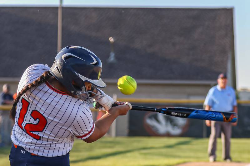 Oswego's Aubriella Garza (12) fouls off a pitch before inducing a walk during Class 4A Plainfield North Sectional semifinal softball game between Wheaton-Warrenville South at Oswego. May 29th, 2024.