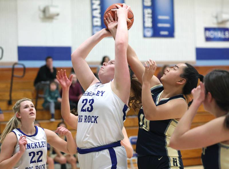 Hinckley-Big Rock’s Sami Carlino gets up a shot in front of Harvest Christian’s Tia Bales Monday, Jan. 8, 2023, during their game at Hinckley-Big Rock High School.