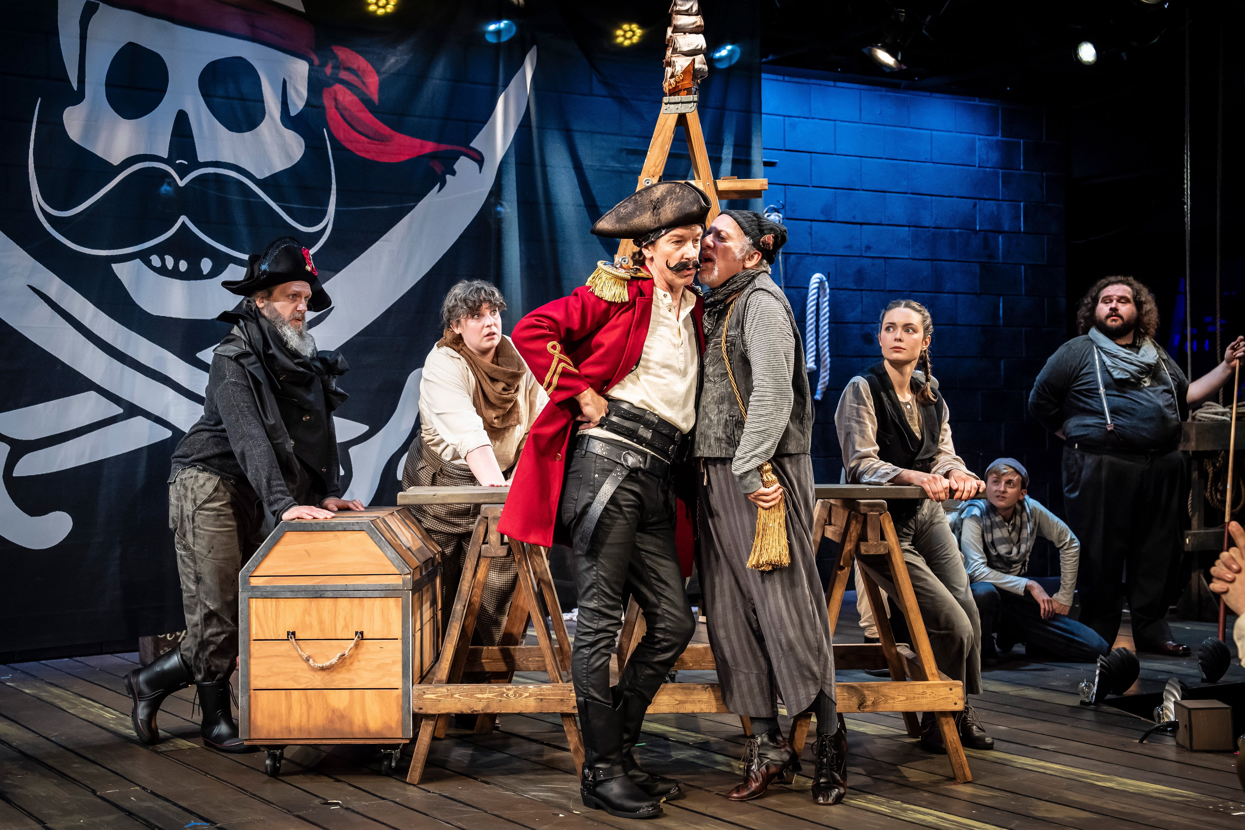 Smee (Mark David Kaplan, right) whispers a secret to his leader, Black Stache (Nick Sandys), in Peter and the Starcatcher, the wildly fun, all-ages prequel to J.M. Barrie's classic “Peter Pan,” packed with clever wordplay, magical stagecraft and swashbuckling escapades. This five-time Tony winner kicks off Paramount Theatre’s third BOLD Series runs July 24-September 1, 2024 at Paramount’s Copley Theatre, 8 E. Galena Blvd. in downtown Aurora. Tickets: paramountaurora.com or (630) 896-6666. Credit: Liz Lauren