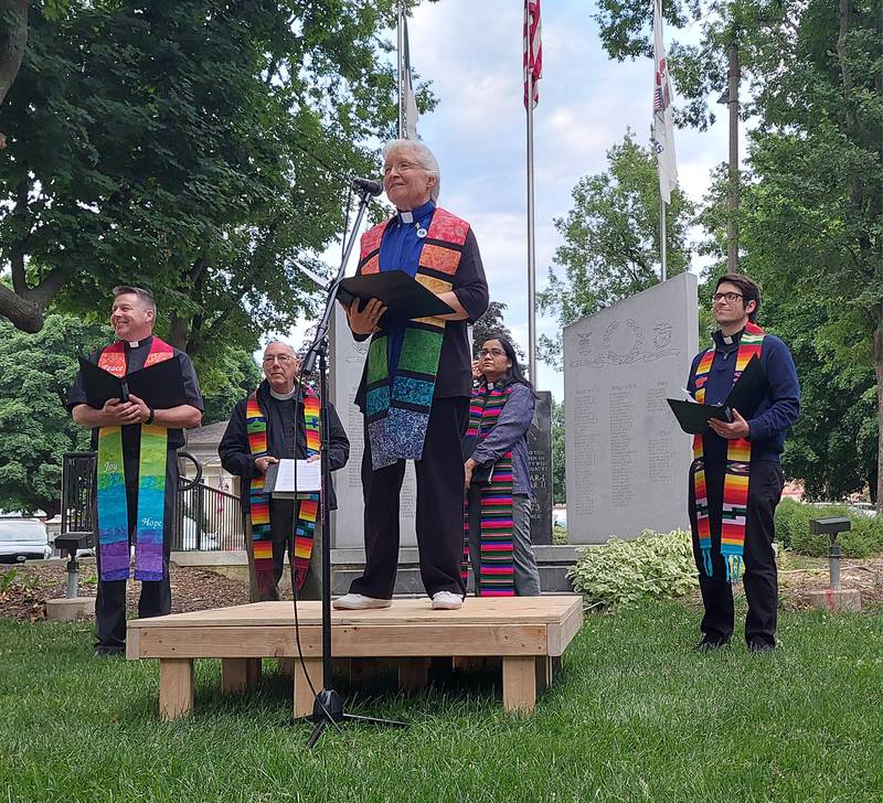 The Rev. Jennifer Amy-Dressler, of Open Table United Church of Christ, Ottawa, speaks Friday, June 7, 2024, during the Pride Night of Remembrance at Washington Square in Ottawa.