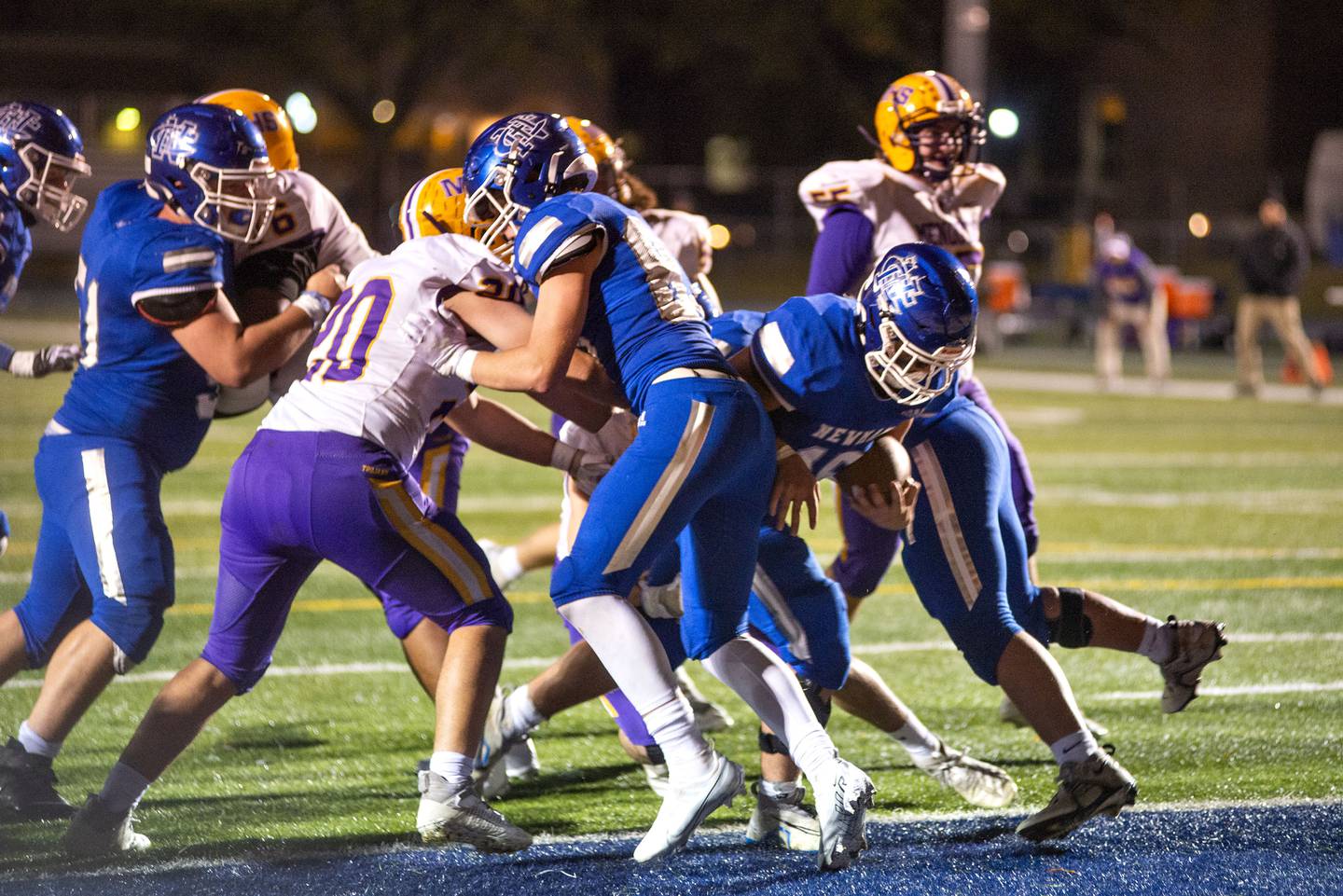 Newman’s Ayden Batten is hoisted by Newman’s Adam Morgan after a touchdown Friday, Oct. 14, 2022 against Mendota.