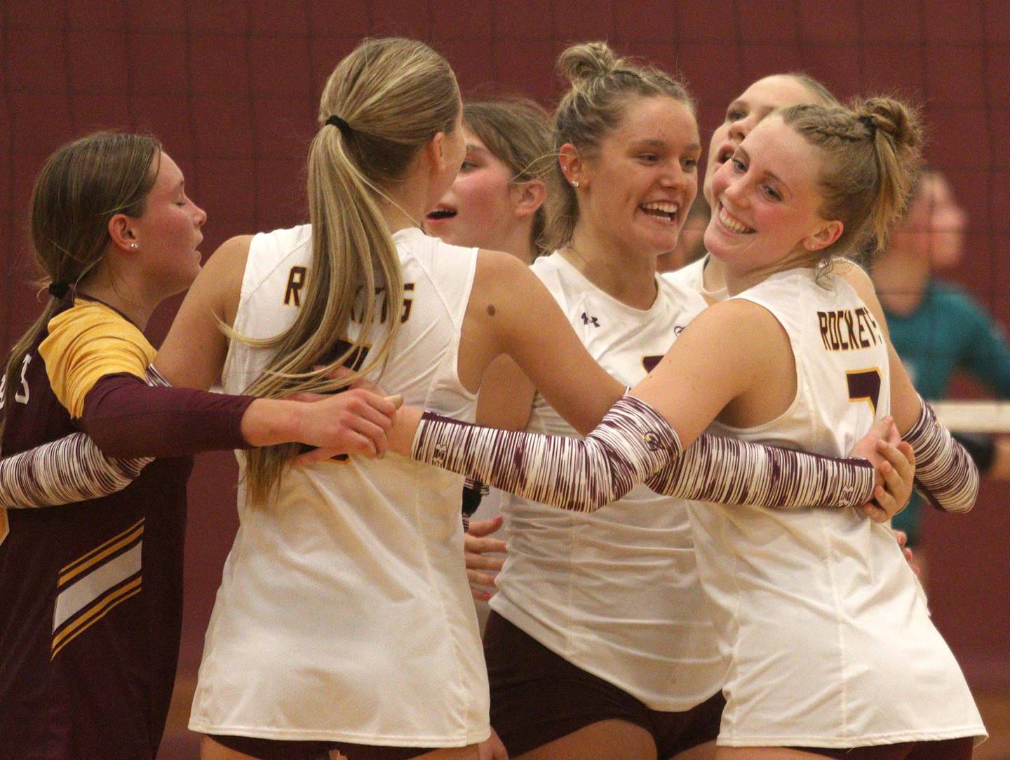 Richmond-Burton’s Rockets celebrate a win over Woodstock North  in varsity volleyball on Monday, Sept. 16, 2024, at Richmond-Burton High School in Richmond.