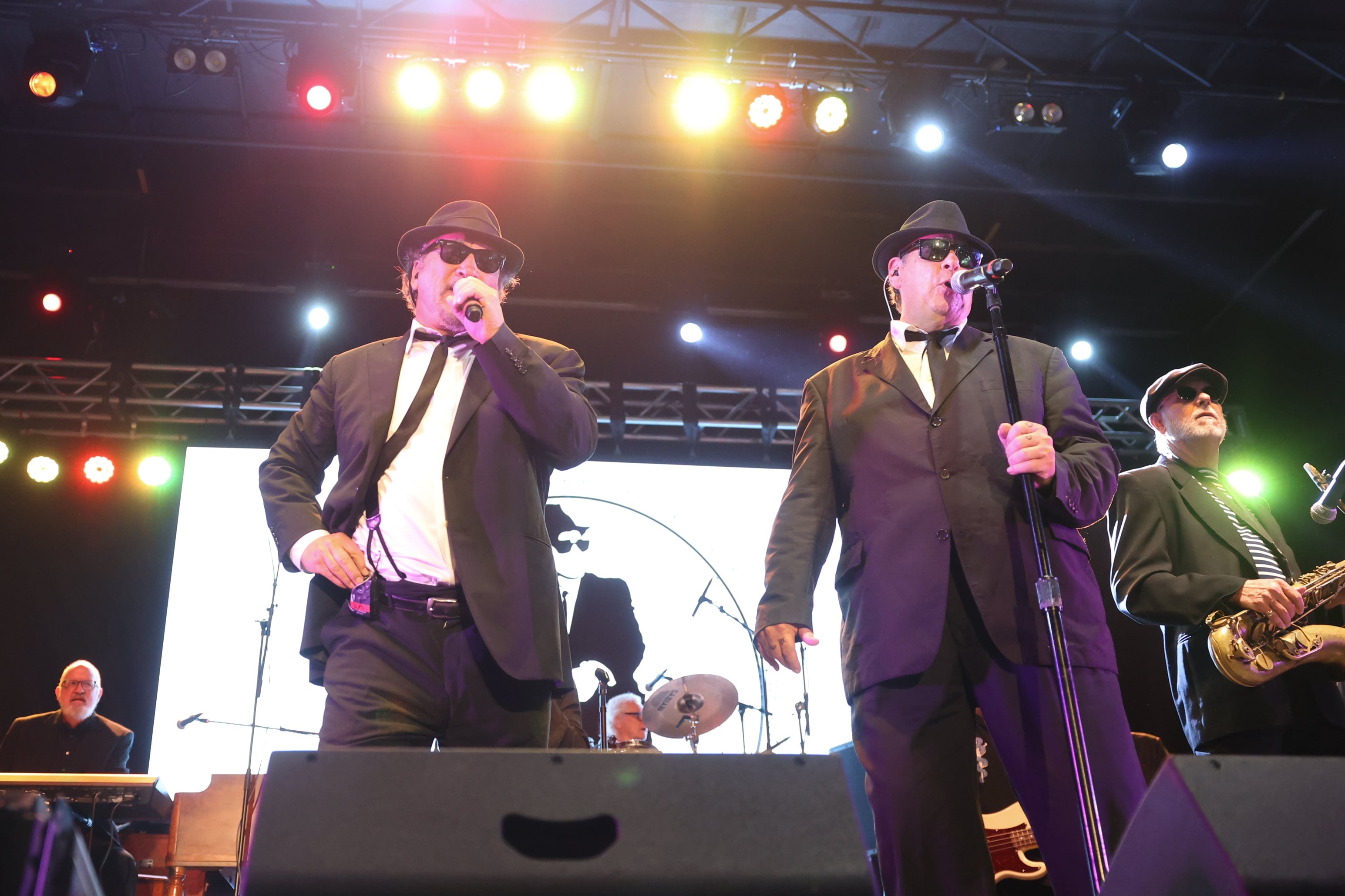 Jim Belushi and Dan Aykroyd of the Blues Brothers perform Friday night at the Blues Brothers Con 2022 at the Old Joliet Prison. Friday, Aug. 19, 2022, in Joliet.