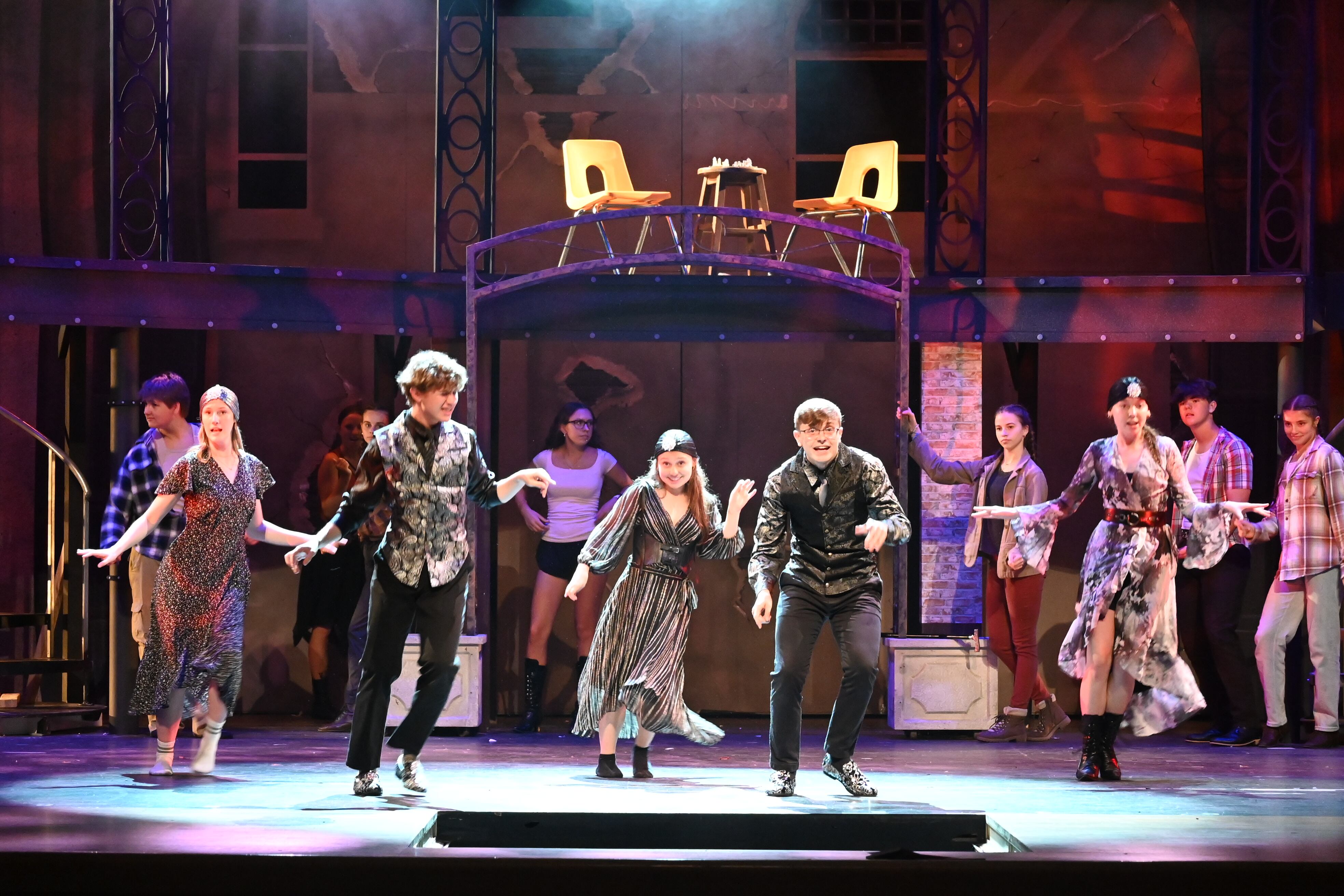 The cast of Hadestown: Teen Edition performance one of the many song-and-dance numbers during the play.