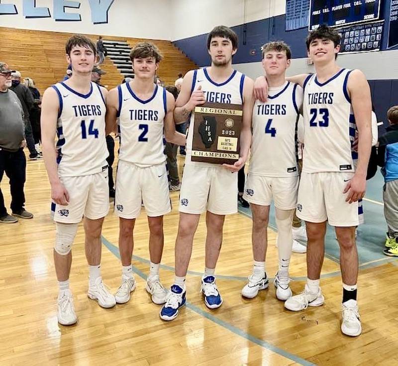 The starting five of Grady Thompson (left), Teegan Davis, Kolten Monroe, Korte Lawson and Noah LaPorte have led the Princeton Tigers to the sectional finals. Surprisingly enough, none of them played at the junior high level, coming together at from different places and schools.