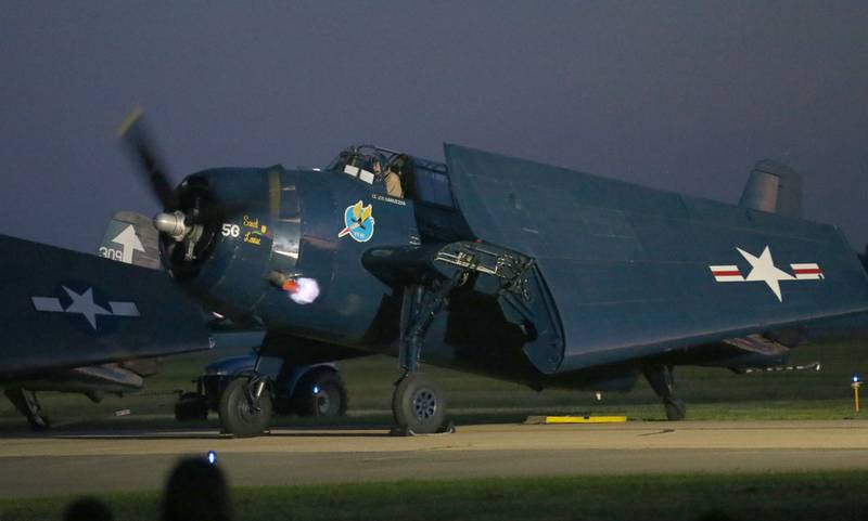 The Sweet Louise emits flames while doing the TBM Glow during the annual TBM Avenger Reunion and Air Show on Friday, May 17, 2024 at the Illinois Valley Regional Airport in Peru.