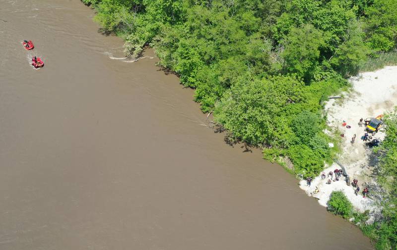 Oglesby, Utica and Tonica firefighters rescue a group of individuals who's raft overturned while on the Vermilion River on Wednesday, May 16, 2024 near Lowell. The group were stranded on a island about a half-mile west of the Illinois Route 178 bridge. The incident happened around 1p.m.