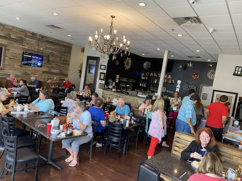 Meals on Wheels (Community Nutrition Network) held two grand-opening buffets for the "Dine Around Town" program Wednesday, June 5, at Two Partners Family Restaurant and Planet Pizza, 212 and 216 Mitchell Drive, Plano. The event received support from the community and officials.