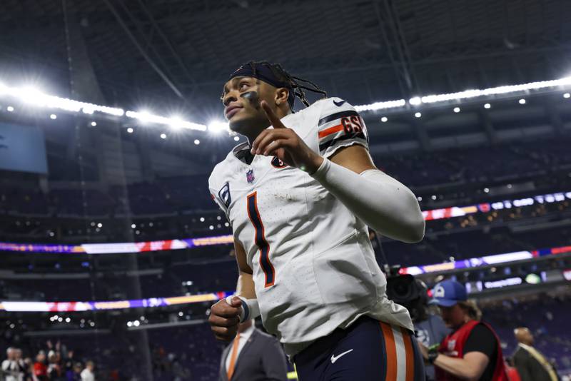 Chicago Bears quarterback Justin Fields reacts on the field after playing against the Minnesota Vikings on Monday in Minneapolis.