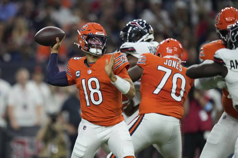 Chicago Bears quarterback Caleb Williams (18) throws during the first half of an NFL football game against the Houston Texans Sunday, Sept. 15, 2024, in Houston. (AP Photo/Eric Christian Smith)