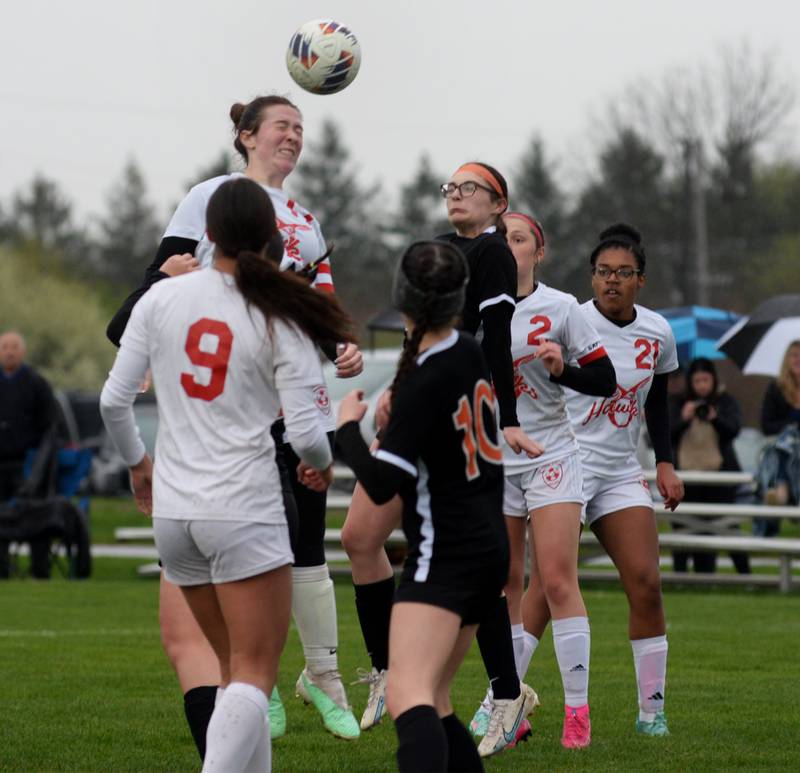 Oregon's Teagan Champley heads the ball on a corner kick against Byron on Thursday, April 18, 2024 at Byron High School. The Tigers won the game 2-1.