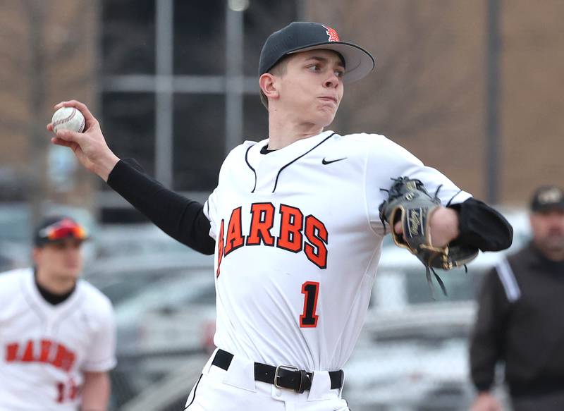 DeKalb's Jackson Kees delivers a pitch during their game against East Aurora Wednesday, March 13, 2024, at DeKalb High School.