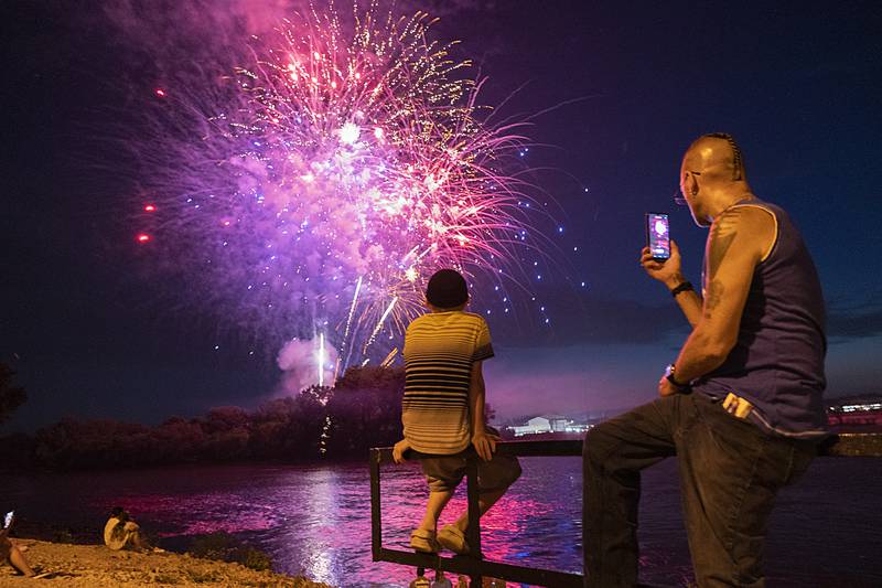 The grand finale of the Sterling-Rock Falls Jaycees fireworks show begin Friday, June 30, 2023 as people gather at the lower dam in Rock Falls to enjoy the sights.