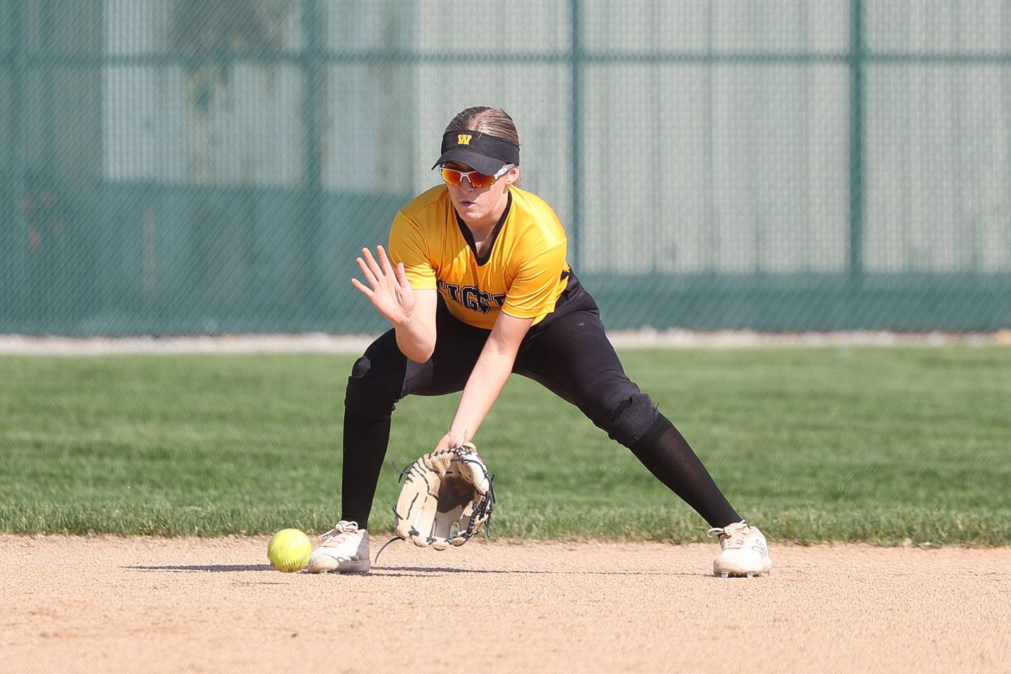 Joliet West’s Avery Houlihan fields a ground ball during warmups before the game against Joliet Central on Monday, May 6, 2024.