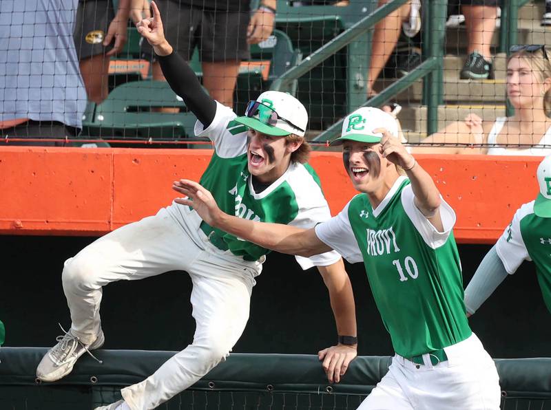 Providence Catholic's Ethan Ganz (left) and Kyle Lipke rush the field after the final out of their Class 4A state semifinal win over Edwardsville Friday, June 7, 2024, at Duly Health and Care Field in Joliet.