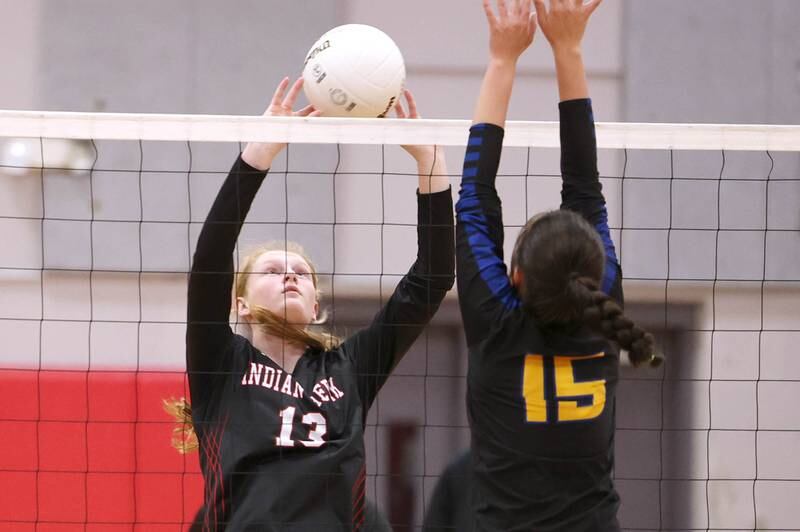 Indian Creek's Allie Peterson tries to get the ball past Somonauk's Josie Rader during their regional first round match Tuesday, Oct. 25, 2022, at Aurora Christian High School in Aurora.