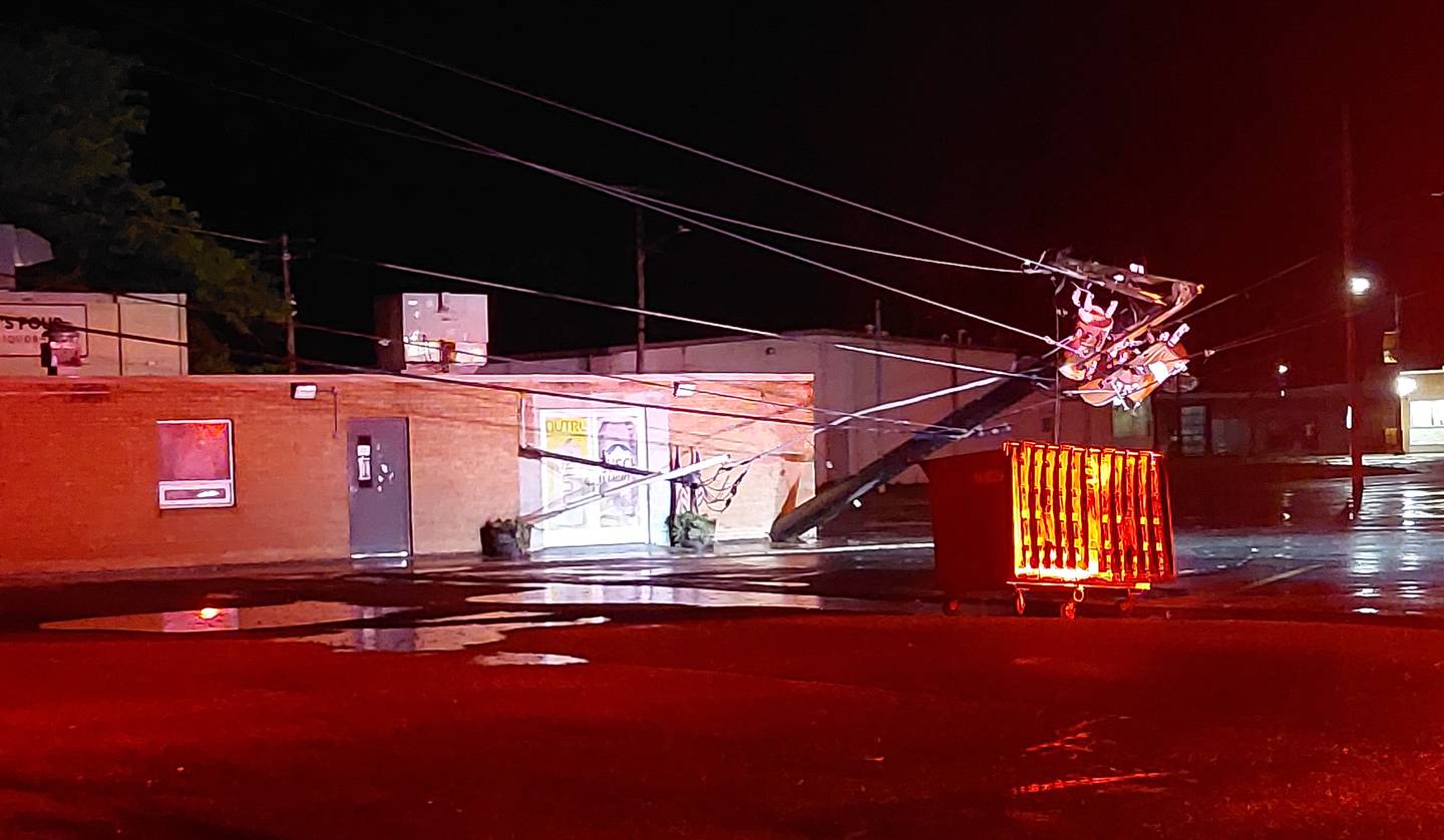 A utility pole was down Monday, July 15, 2024, at Pat's Pour in Streator following a storm with heavy wind gusts.