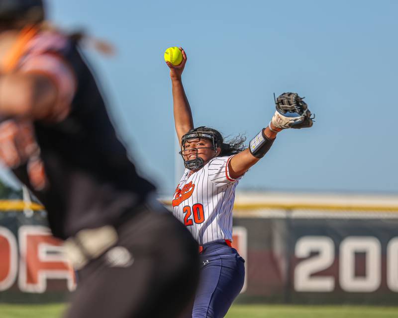 Oswego's Jaelynn Anthony (20) delivers a pitch during Class 4A Plainfield North Sectional semifinal softball game between Wheaton-Warrenville South at Oswego. May 29th, 2024.