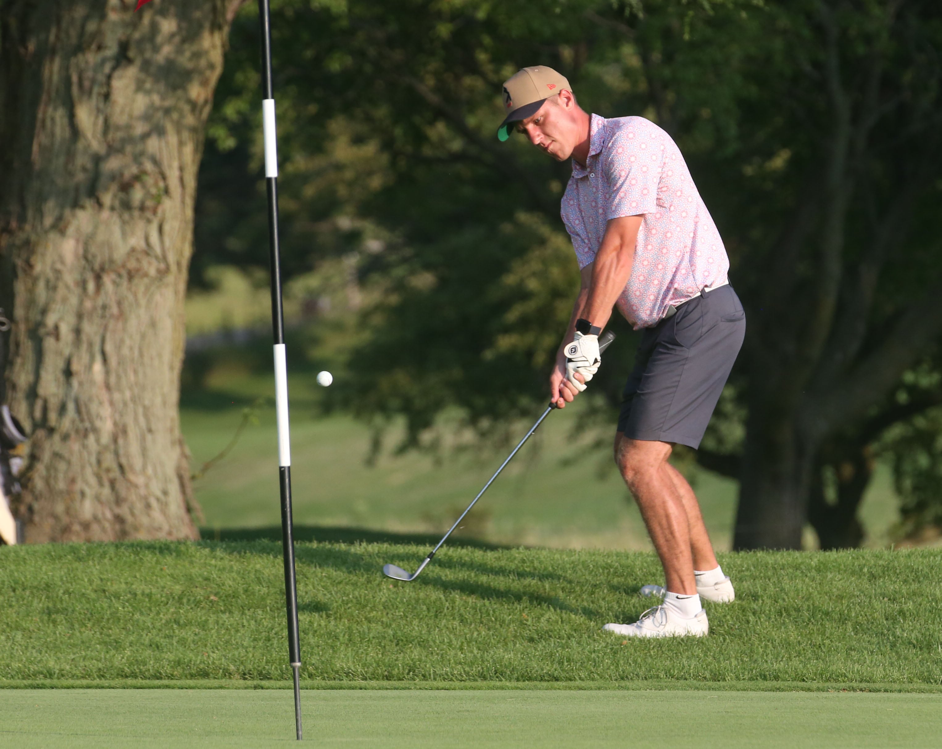 Caleb Dzierzynski golfs on the 18th hole during the Illinois Valley Mens Golf Championship on Sunday, July 28. 2024 at Mendota Golf Club.