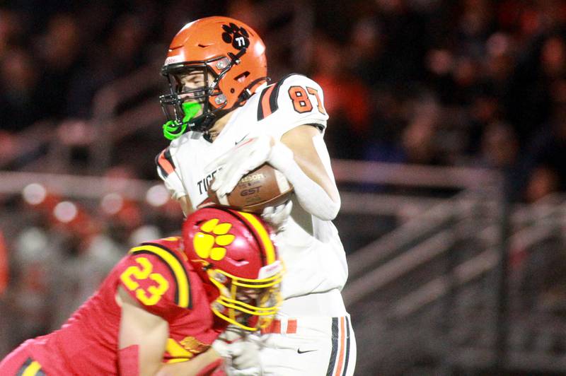 Batavia’s Josh Kahley (left) tackles Wheaton Warrenville South’s Brady Goken on Friday, Oct. 18, 2024 during a game at Batavia.