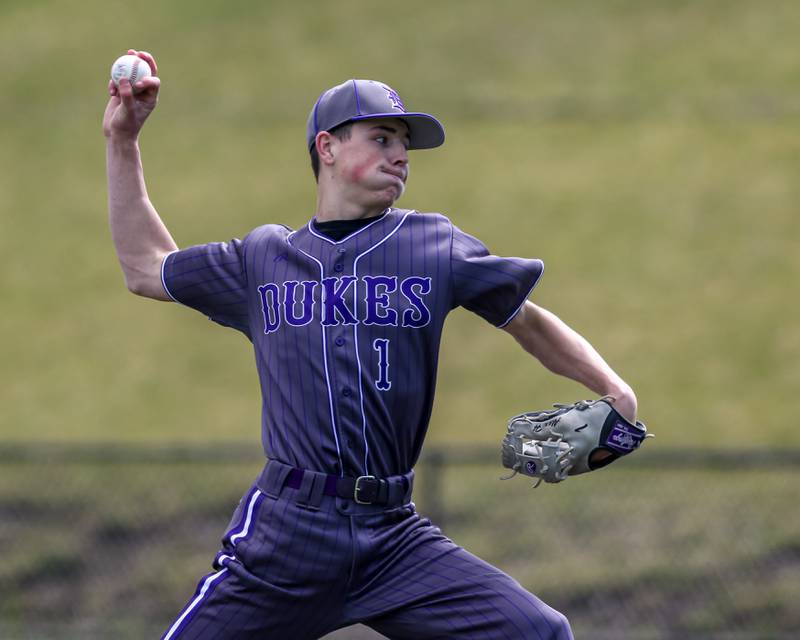 Dixon's Alex Harrison (1) delivers a pitch during baseball game between Dixon at Hampshire.  March 28, 2024
