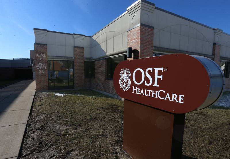 A new OSF Healthcare sign is erected near the Building B entrance at 920 West Street at the former IVCH and St. Margaret's Hospital on Tuesday, Feb. 20, 2024 in in Peru