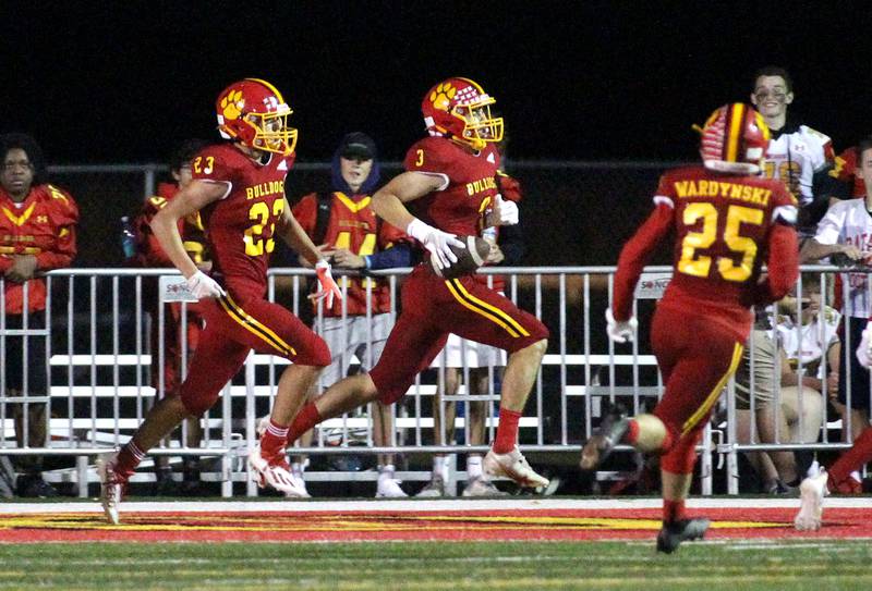 Batavia's Ryan Whitwell (3) celebrates his touchdown after a turnover during a home game against Glenbard North on Friday, Sept. 24, 2021.